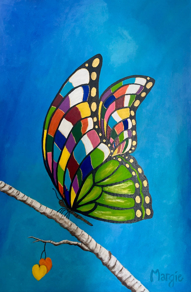 A beautiful butterfly sitting on a branch